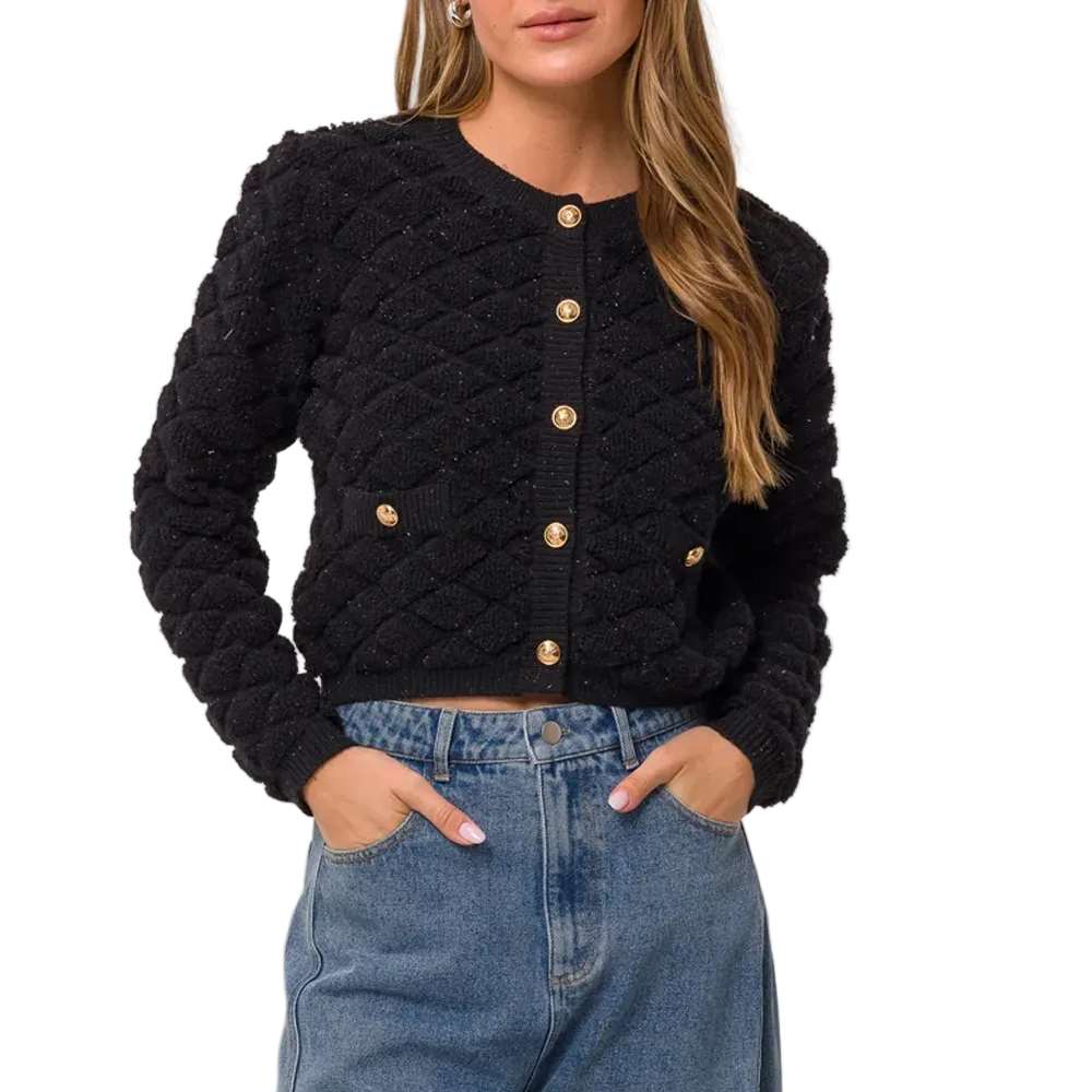 Gilet noir pour femme avec texture et boutons dorés